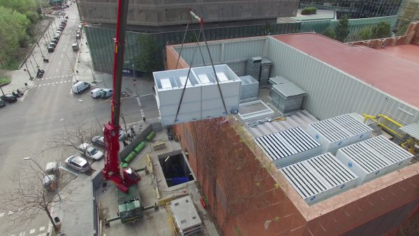 truck crane aerial drone view huge truck crane lifting a cooling tower aerial view sho SBI 351454379